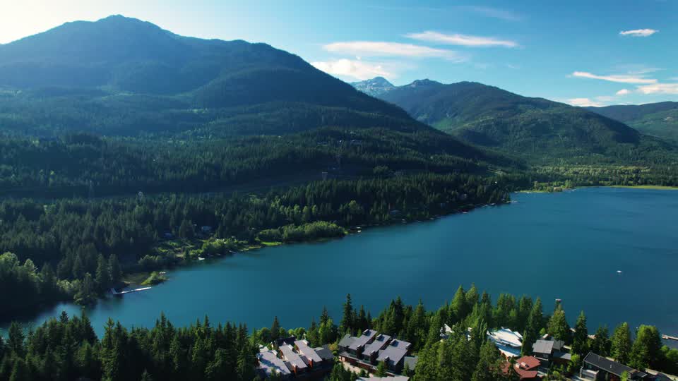 Alta Lake and homes in the forest below the mountains